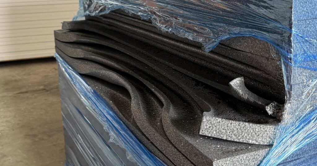 Graphite EPS insulation panels deformed by heat after sun exposure on a 30°C day